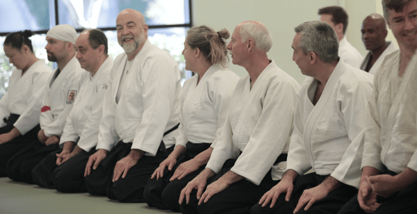 Students sitting in preparation for Aikido class